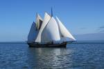Two-masted clipper Avontuur under full sail on open water