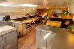 Open kitchen and dining area of the two-masted clipper Avontuur
