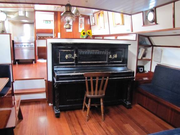 Piano in the saloon of the tjalk Aagtje