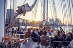 Group on the deck of the Abel Tasman in the evening sun