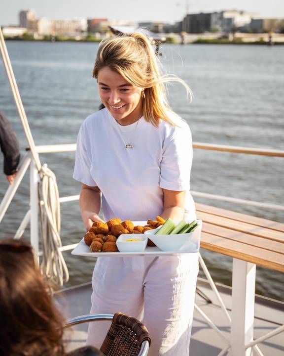 Snacks being served on the deck of the Abel Tasman