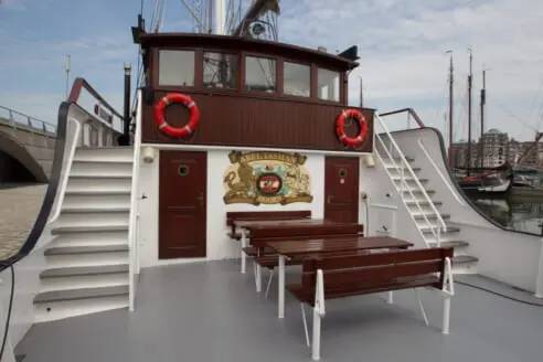 Middle deck of the Abel Tasman with benches and stairs