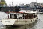 Saloon boat Adeline viewed from the front on the water
