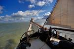 Water spraying beside the deck of the Albatros under sail