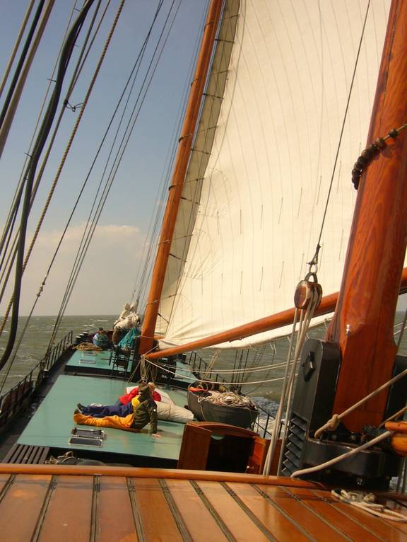 View from the wooden deck beneath the sails of the Aldebaran