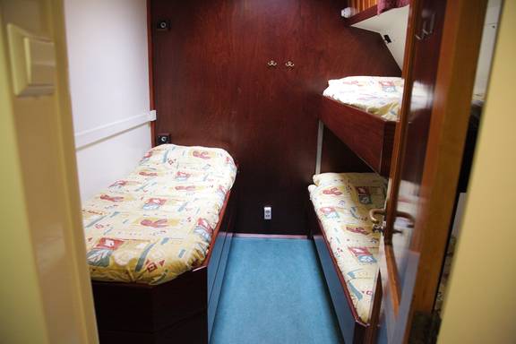 Three-berth cabin with a bunk bed on the Aldebaran