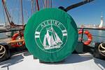 Green wheel cover with the Allure logo