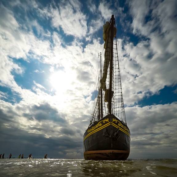 Bow of the Ambiance on the exposed tidal flats