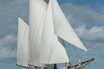 Anna Trijntje under white sails on open water