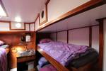 Four-berth cabin with bunk beds on the Anna Trijntje