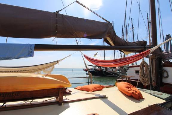 Hammock and cushions on the deck of the Anna Trijntje