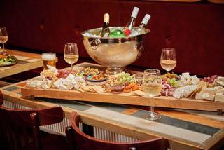 Sharing platter and glasses of wine aboard the clipper Anna