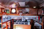 Galley of the Avondrood with a cooker and beer tap