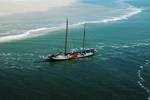 Aerial view of the Avontuur near the sandbanks of Terschelling