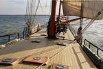 Wooden deck of the Avontuur while sailing