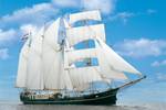 Barquentine Summertime with white sails hoisted