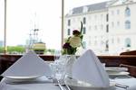 Table set aboard the Dame van Amstel overlooking the National Maritime Museum