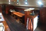 Saloon of the Dankbaarheid with wooden tables and benches