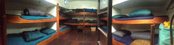 Cabin with wooden bunk beds on the Dankbaarheid