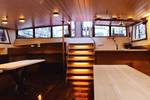 Saloon of De Hester with dining tables and benches