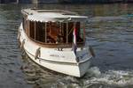 Saloon boat Emma cruising, viewed from the bow