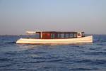 Saloon boat Emma cruising on open water