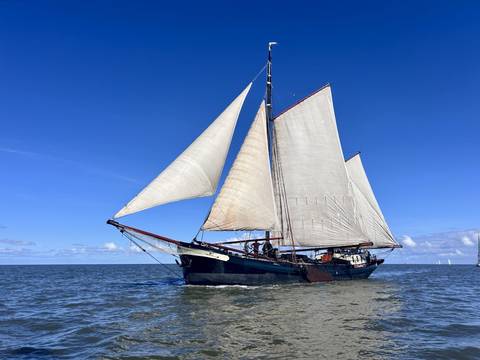Clipper Engelburg under white sails on open water
