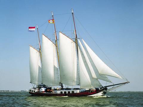 Three-masted Frisius van Adel under white sails