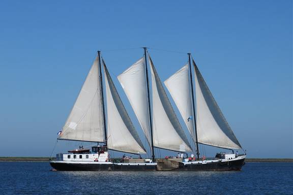 Three-masted Grietje with white sails hoisted