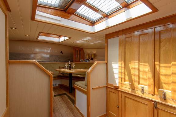Wood-panelled interior of the Grote Jager beneath the skylight
