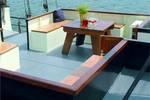 Deck seating area of the Johanna Engelina with benches and a wooden table