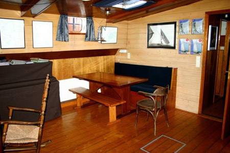 Wooden seating area in the saloon of the Johanna Engelina