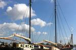 Korevaer moored in the harbour beneath a blue sky
