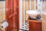 Bathroom of the Leafde fan Fryslân with a shower cubicle and washbasin