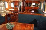 Saloon of the Mars with wooden tables and green benches