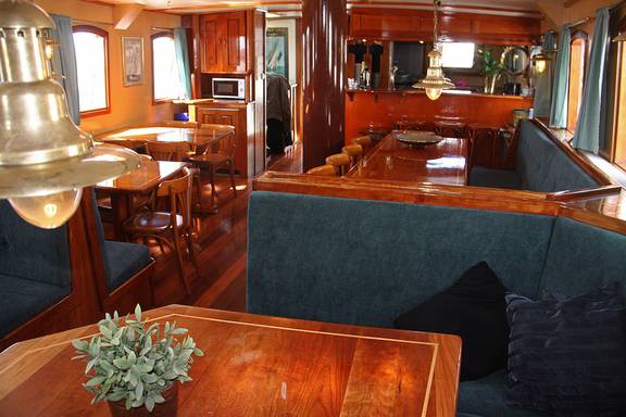 Saloon of the Mars with wooden tables and green benches
