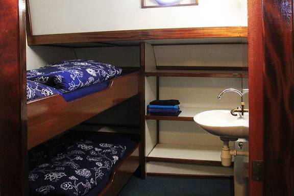 Cabin with bunk beds and a washbasin on the Mars