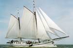 Two-masted clipper Mars with white sails hoisted