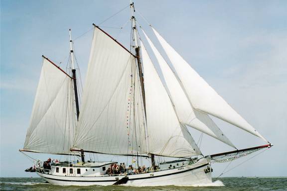 Two-masted clipper Mars with white sails hoisted