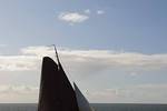 Medusa under brown sails in the sunshine on open water