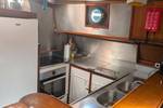 Galley with a cooker and refrigerator on the Meridiaan