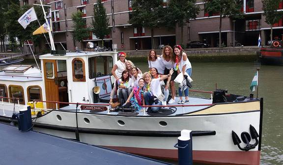 Guests aboard the saloon boat Oude Maze