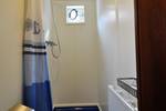 Shower and washbasin in the bathroom of the Poseidon