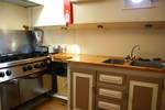 Galley of the Pouwel Jonas with a cooker and sink