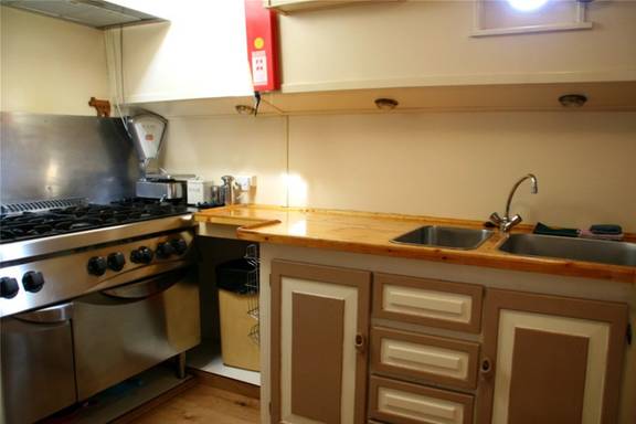 Galley of the Pouwel Jonas with a cooker and sink