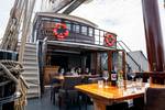 Tables set on the deck of the Simmer fan Fryslân