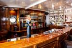 Wooden bar in the saloon of the Simmer fan Fryslân