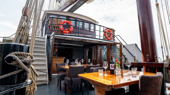 Tables set on the deck of the Simmer fan Fryslân