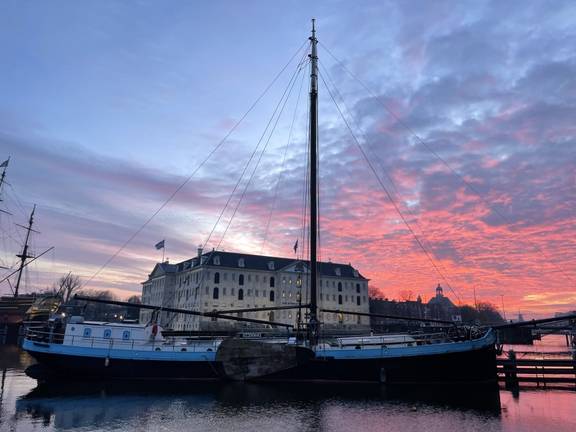 Spartivento moored beneath a pink evening sky