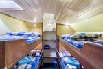Four-berth cabin with bunk beds on the Spes Mea
